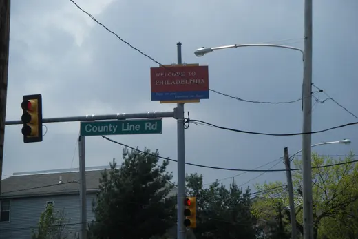 Intersection with County Line Rd sign and Welcome to Philadelphia banner, Bustleton, Pennsylvania