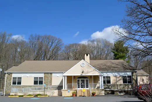 Small community building with parking and wheelchair ramp in front., Edgmont Township, Pennsylvania
