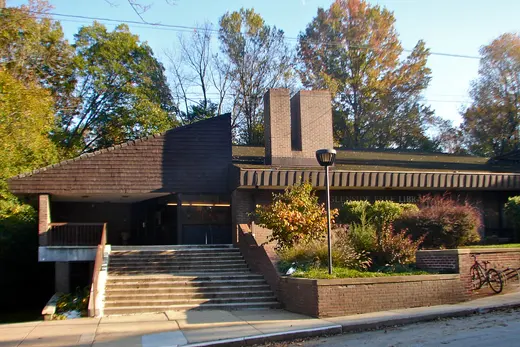 Brick community library building with steps and trees., Glenside, Pennsylvania