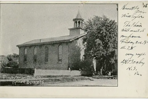 Presbyterian church in Kennett Square with trees and picket fence, Kennett Square, Pennsylvania