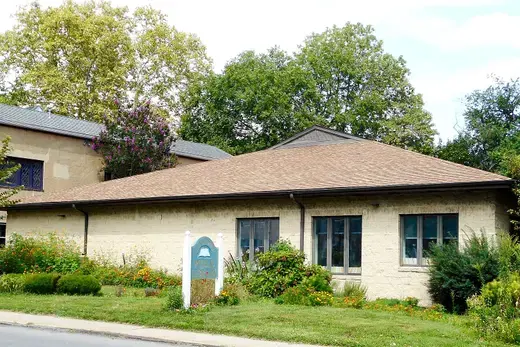 Single-story building with garden and a 'Public Library' sign., Lansdowne, Pennsylvania