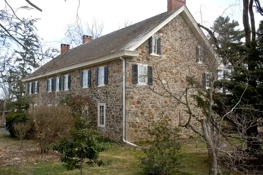 Stone two-story house with shutters and surrounding yard., West Nantmeal Township, Pennsylvania