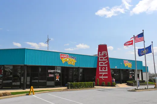 Herr's snack factory building with flags and parking lot., West Nottingham Township, Pennsylvania