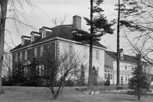 Large historic house with trees in front, black-and-white photograph, Whitemarsh Township, Pennsylvania