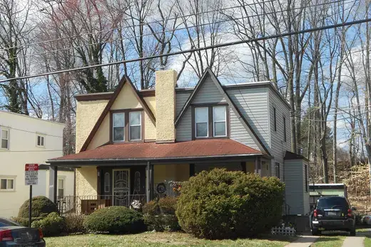 Two-story suburban house with front porch and driveway., Yeadon, Pennsylvania